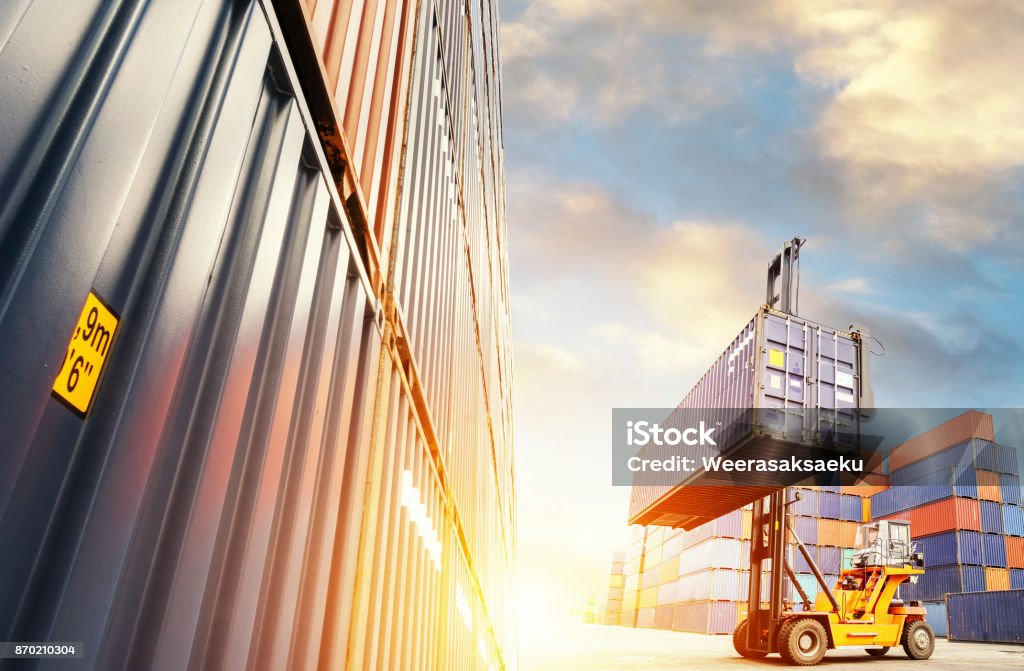 Forklift handling container box loading Forklift handling container box loading to freight trainer Forklift Stock Photo