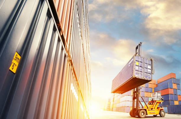 forklift is lifting a container