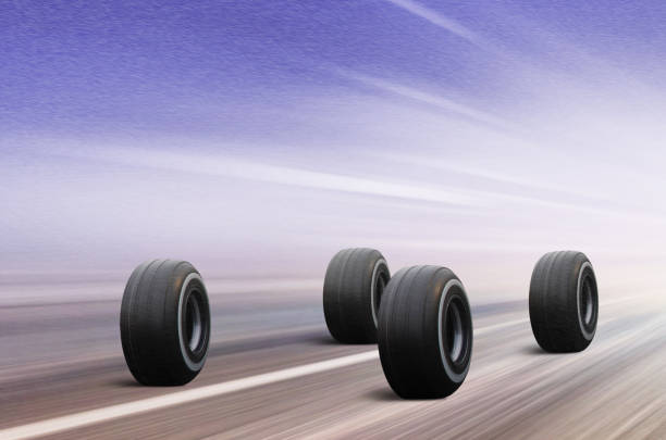 istock four tires on winter road 870214424