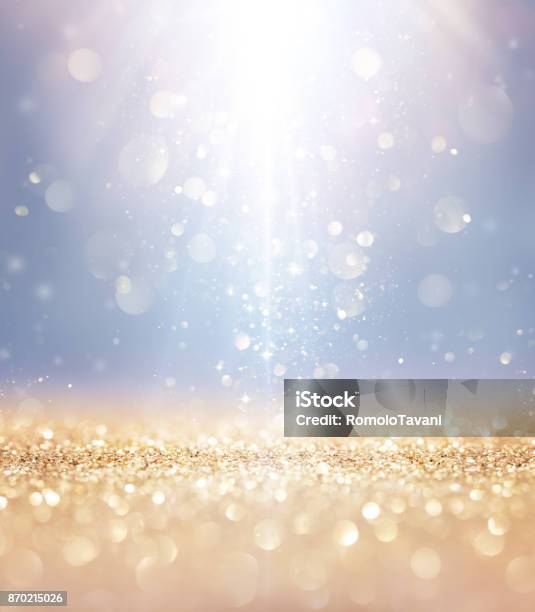 Christmas Shiny Lights And Stars Falling On Golden Glitter Stock Photo - Download Image Now