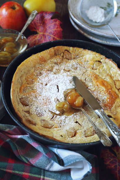istock Apple dutch baby lush pancake and green grapes jam dressing 870219198