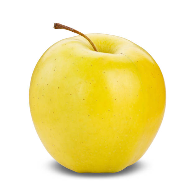 istock Fresh yellow apple isolated on white. 870221980