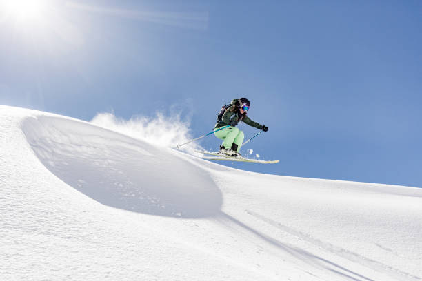 istock Female skier jumping 870227396
