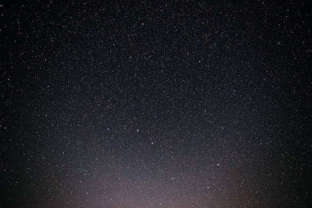 istock Background of grizzle and blue starry night sky 870227532