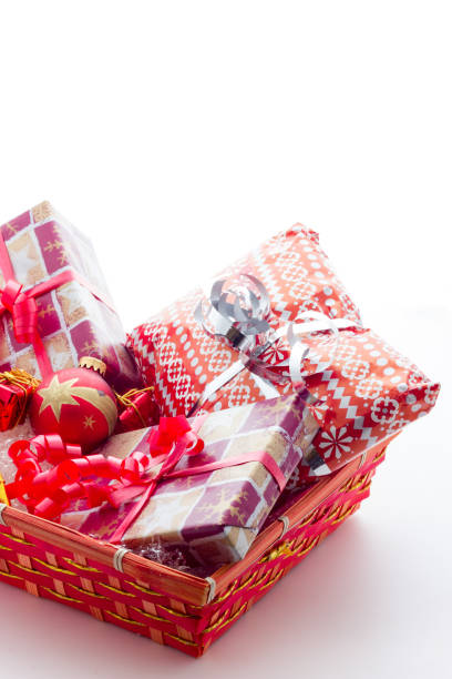 istock Basket with Christmas gifts 870230168