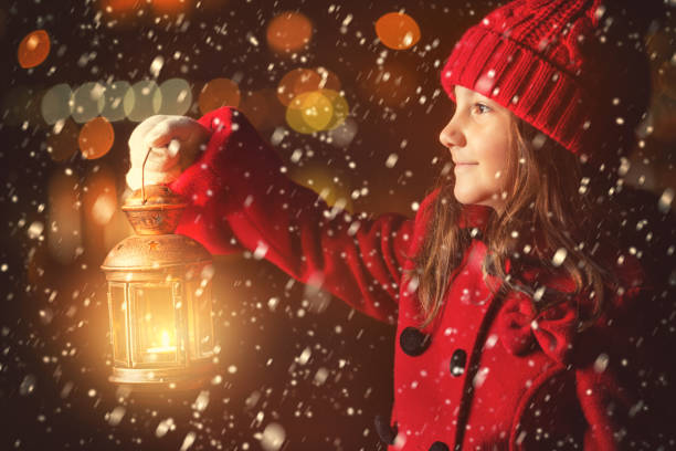 istock Beautiful Little Girl With Lantern Outside 870237290