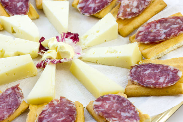 istock Appetizer with cheese and Italian salami 870237494