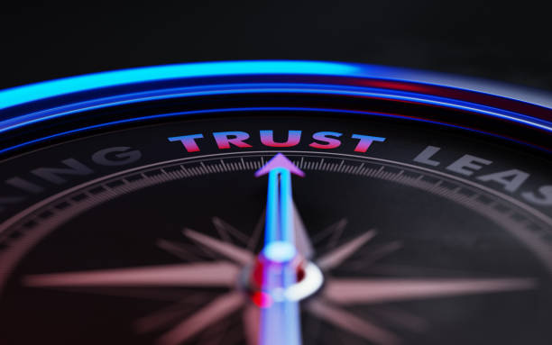 istock Trust Concept: Arrow of A Compass Pointing Trust Text 870237560