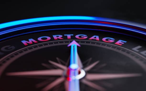 istock Mortgage Concept: Arrow of A Compass Pointing Mortgage Text 870239944