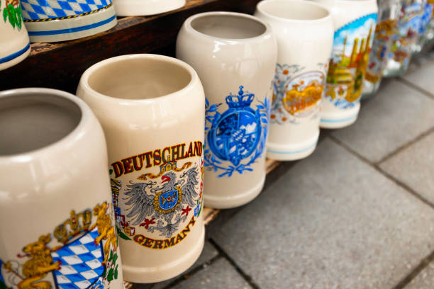 munich, germany - april 30 2013 : group of traditional german beer steins. famous souvenir of germany for its delicious beers and oktoberfest. - oktoberfest beer munich german culture imagens e fotografias de stock