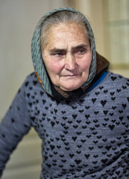 istock Old farmer woman indoor 870247266