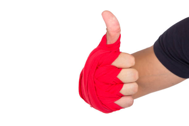 istock Martial Arts Man Hand with Red Boxing Wraps 870248094