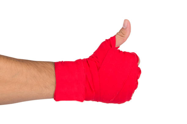istock Martial Arts Man Hand with Red Boxing Wraps 870250340