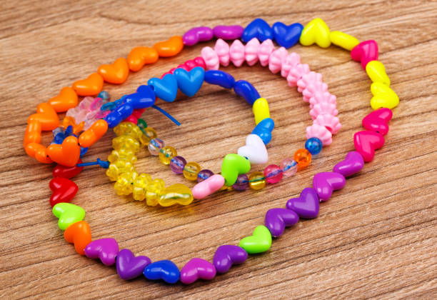 istock bead bracelet with beautiful handcrafted wooden background 870255414