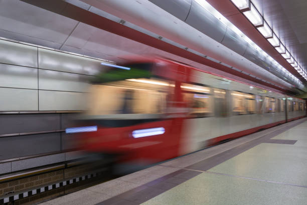 istock Moving red and white subway in the underground from the side 870261242