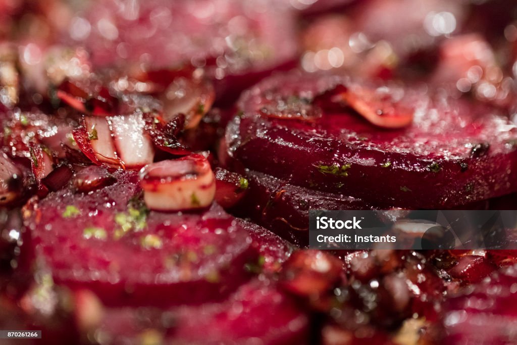 Caramelized beetroot background, with shallots and green onions. Food photography. Common Beet Stock Photo