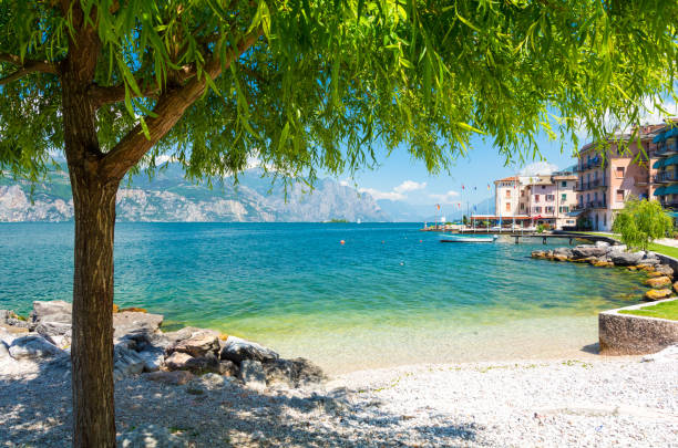 Beautiful beach on Garda Lake, Italy Relax time on garda lake lake garda photos stock pictures, royalty-free photos & images