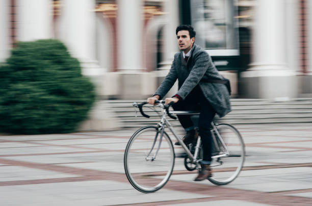 istock Man riding a bicycle in the city 870271024