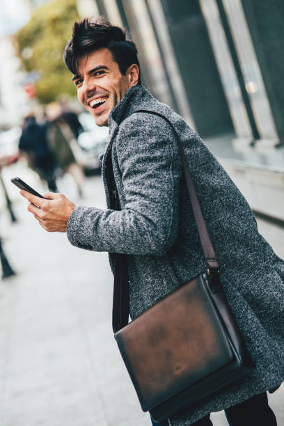 istock Man texting in the city 870271040