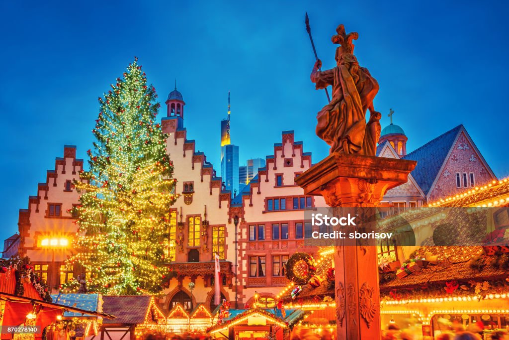 Christmas market in Frankfurt Traditional christmas market on Roemer Platz in Frankfurt, Germany Illuminated Stock Photo