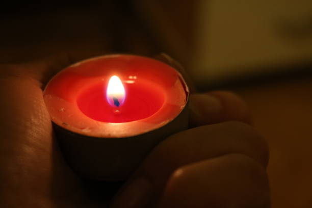 istock Hope of candle light 870278520
