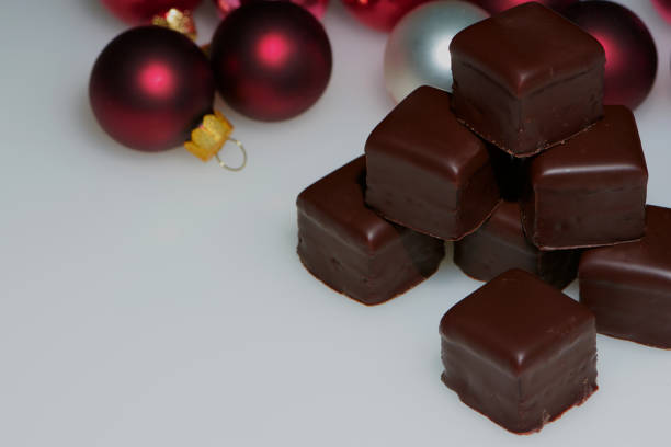 istock Dominoes and Christmas tree balls for Christmas, text space 870281042