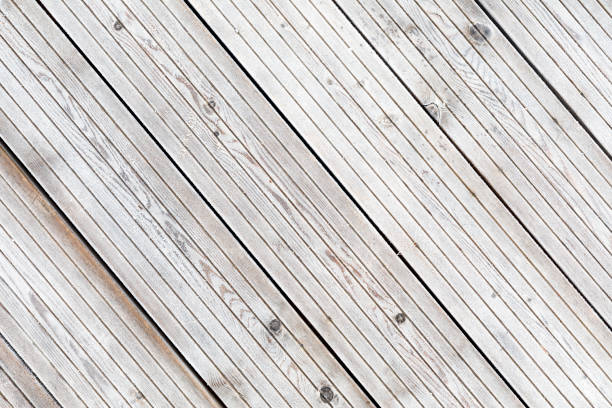 istock Aligned frozen striped blank boards in winter 870283974