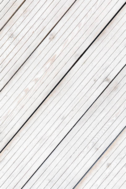 istock Aligned frozen striped blank boards in winter 870284430