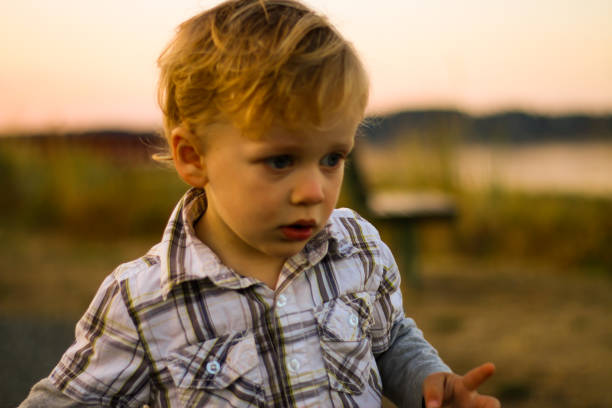 istock Spirited Child on the Beach at Sunset 870287258