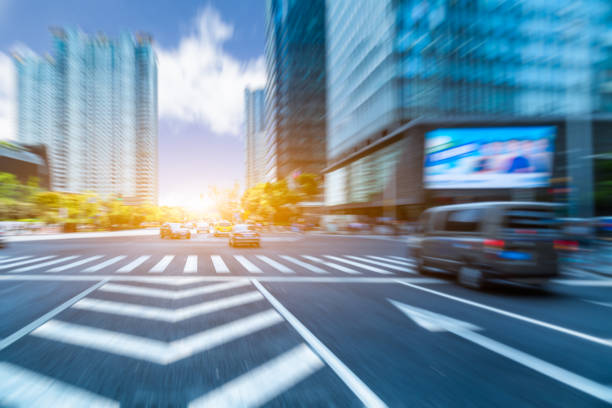 istock City road with moving traffic 870306976
