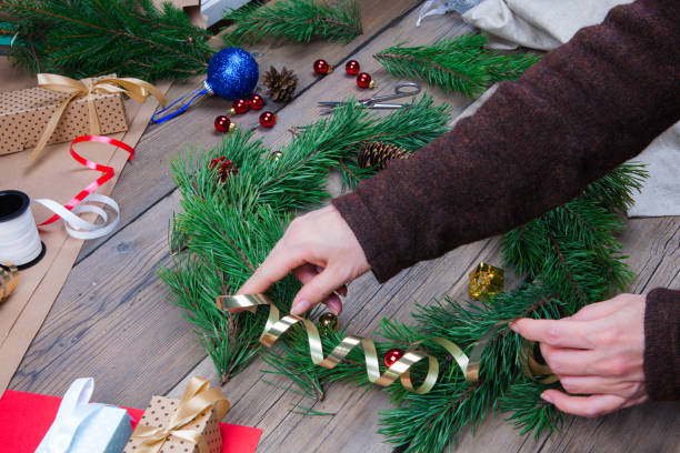 istock Woman making Christmas wreath 870307046
