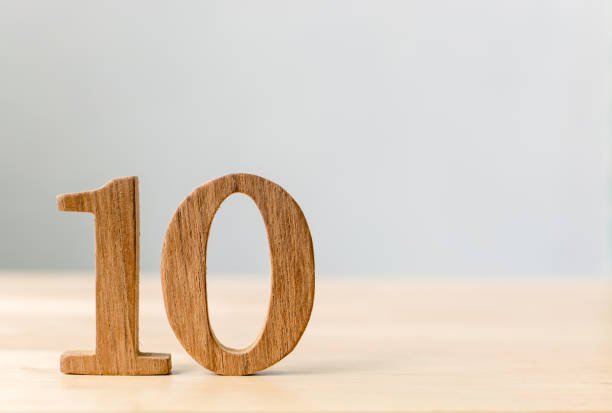 istock Wood sign number ten on table with copy space 870307482