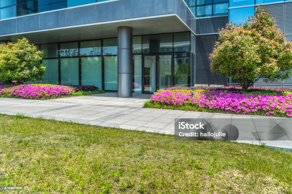 Business district and green Front or Back Yard, Window, City, Cityscape, Springtime Business Stock Photo