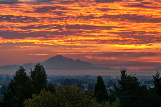 istock Sunrise glow over Mt. Baker, view from Vancouver, BC, Canada 870309618