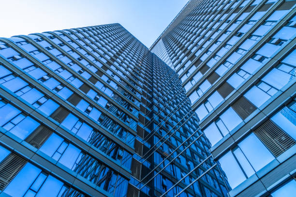 istock Low angle view of modern metallic skyscrapers 870310008