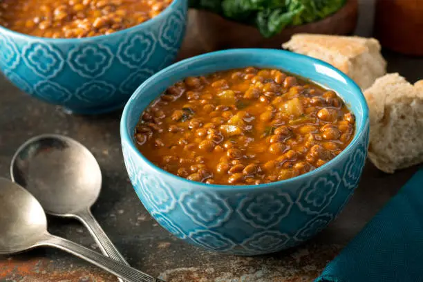 A bowl of delicious hearty homemade curried lentil soup.