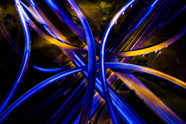 istock Night Travel Long Exposure drone view Austin Texas Highway Interchange 183 and Mopac blue and purple colors 870335866