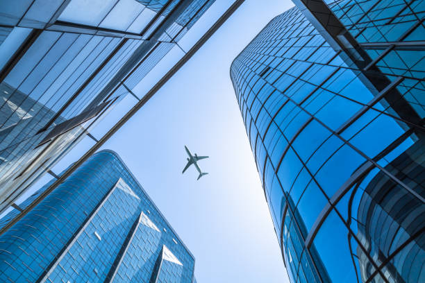 istock Plane flying over the skyscrapers 870341870