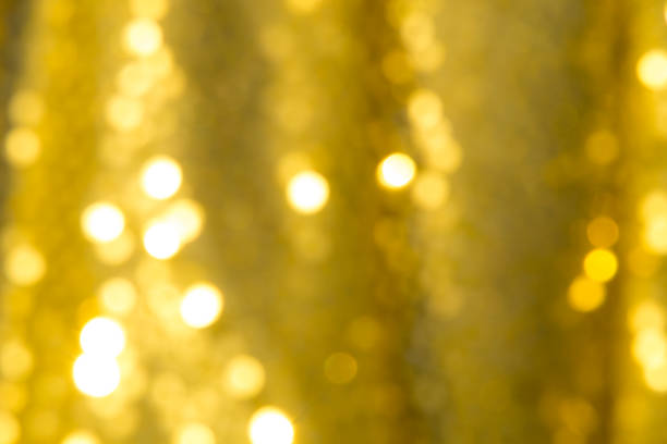 istock Golden holiday festive bokeh background 870342322