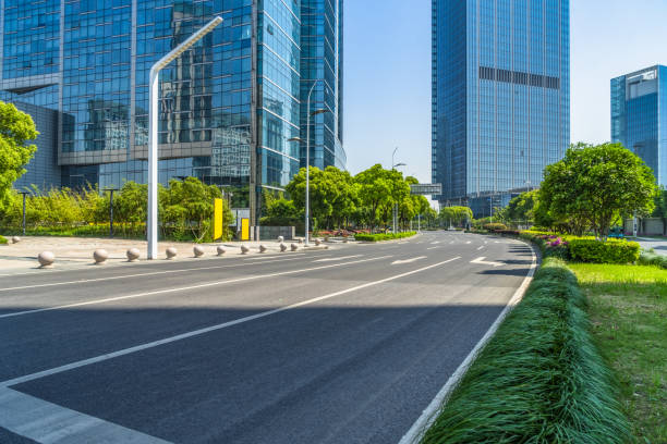 istock Empty road front of modern buildings 870351662