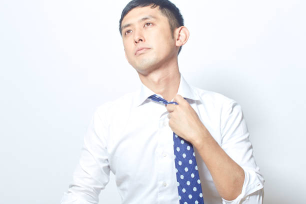 istock Loosening tie for a break 870352080