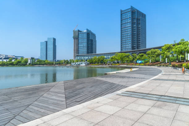 istock Empty wooden floor nearby office building 870358336