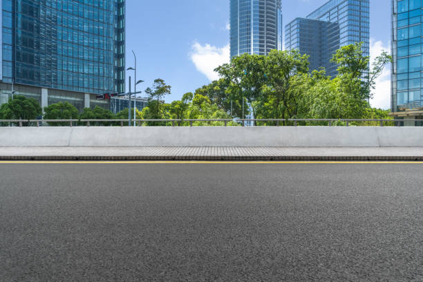istock Empty road front of modern buildings 870358838