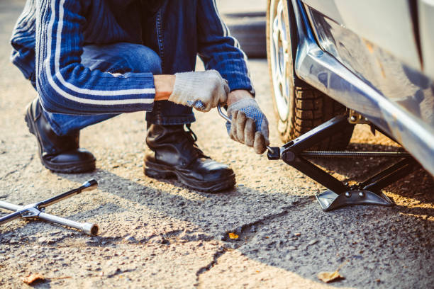 istock raises the car on a Jack 870358886