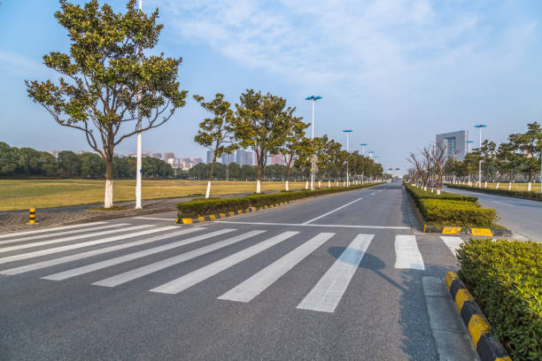 istock City empty road with modern buildings background 870361670