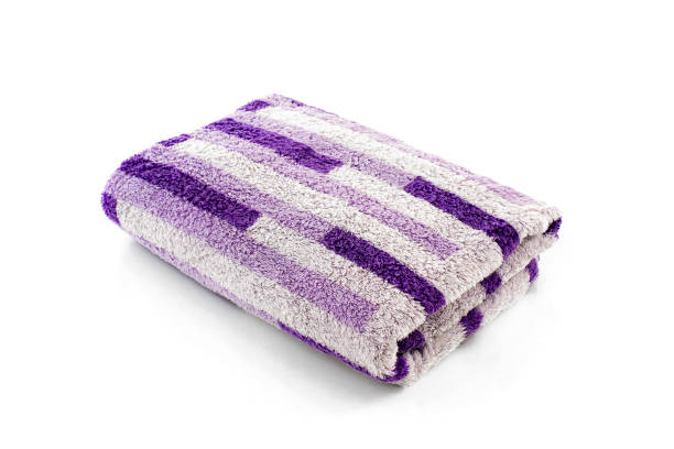 istock towel isolated on white background 870365658