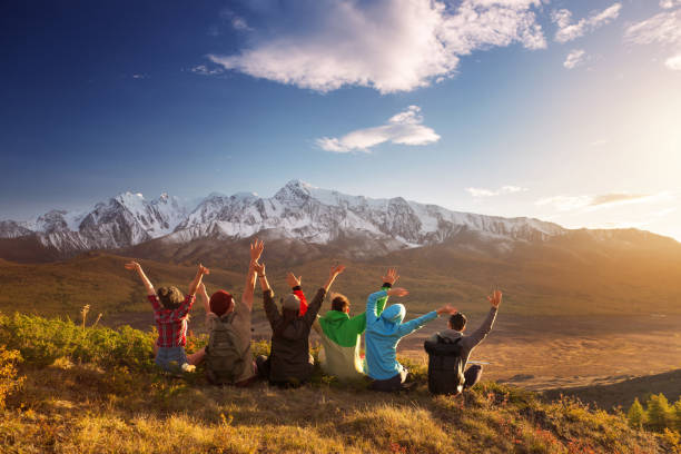 group happy friends having fun mountain top - people traveling journey group of people hiking imagens e fotografias de stock