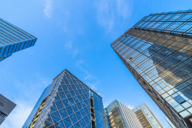 istock High modern skyscrapers over blue sky 870384450