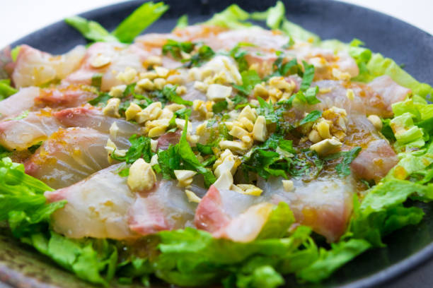 Japanese style carpaccio with sea bream Japanese style carpaccio with sea bream shiso photos stock pictures, royalty-free photos & images