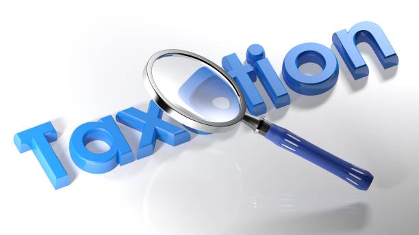 istock Magnifier on Taxation blue write - 3D rendering 870394414